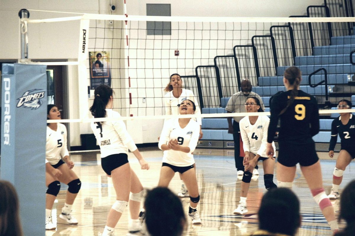 Contra Costa Comet player no#. 9, Lesley Jimenez MH steadied herself in setting up for the shot, as teammates no#. 5, Isabel Fernandez RS, 7, Delanna Giacomelli S and 4, Ashley Gutierrez OH/Oppo, positioned themselves to give support.  

San Pablo Ca 18 October 2023, Contra Costa College, Women’s Volleyball vs Los Medanos College