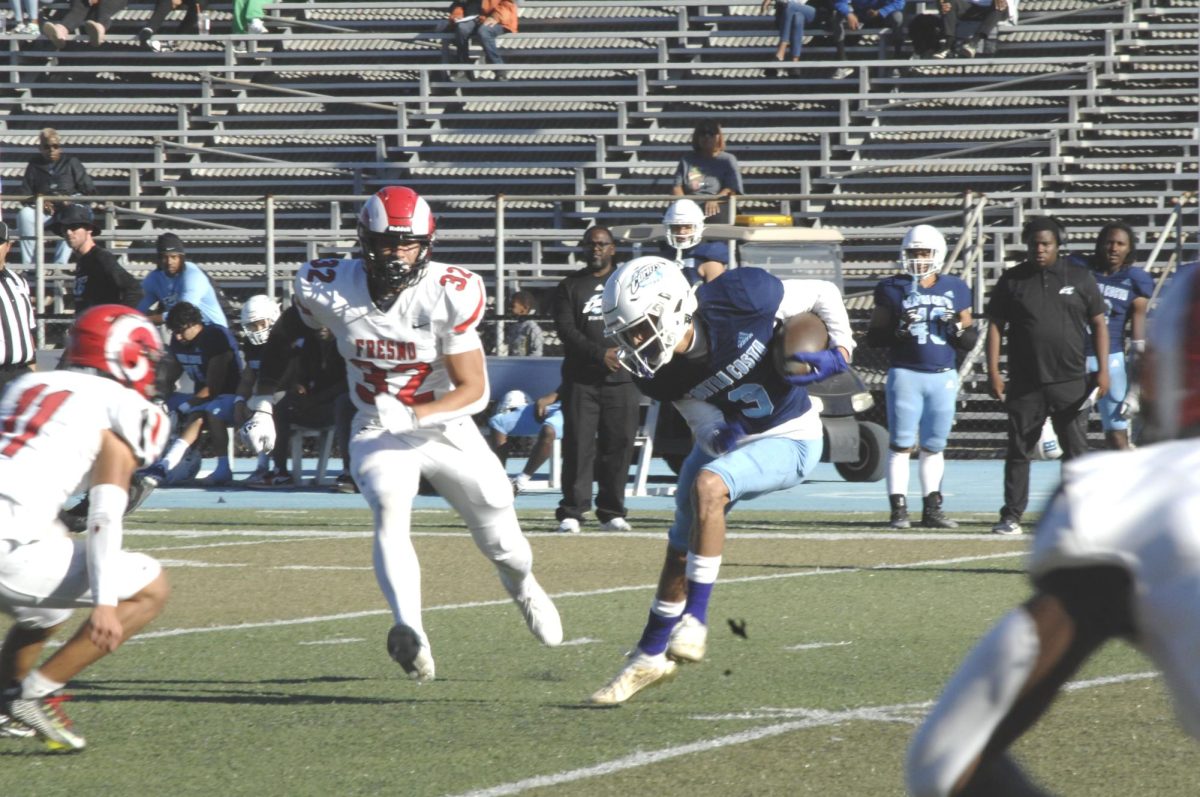 Contra Costa Comet player no#. 9 DB Tasean Young, takes a second, to show Fresno City Rams, the Comet step
 
San Pablo Ca 28 October 2023, Contra Costa College “Homecoming” vs Fresno City
