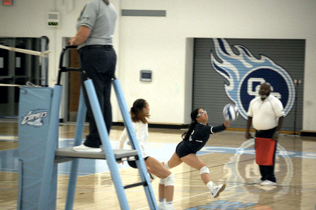 Contra Costa Comet player no#. 2, Jilliane Magpantay LIB ERO, with her agility and speed, she attempts to save the ball 

San Pablo Ca 08 November 2023, Contra 
Costa College, Women’s Volleyball  vs College of Marin
