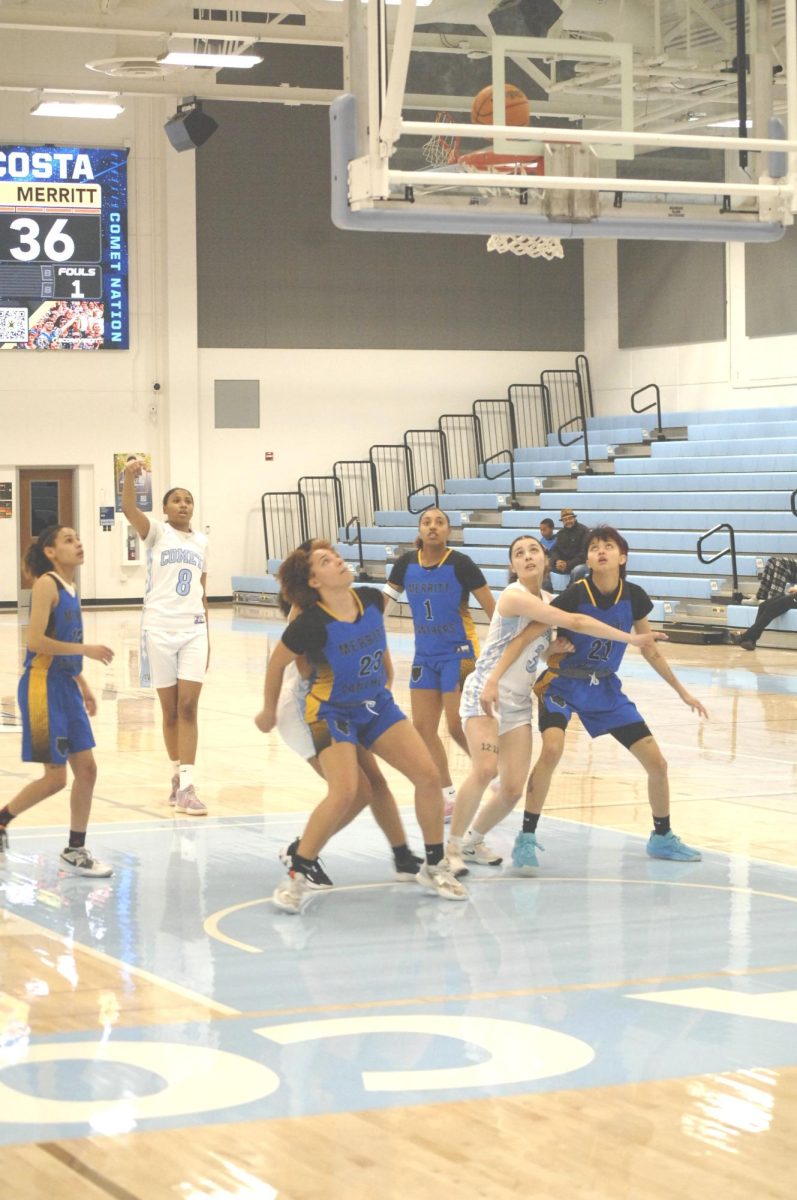 Contra Costa Comet player no#. 8 score another point with skill and ease.

San Pablo Ca 26 January 2024, Contra Costa College, Women vs. Merritt College Women Basketball game.  
