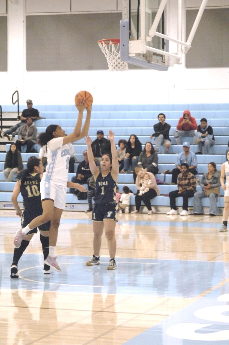 The Lady Comet player, No.# 8 takes it to the hoop. Contra Costa College, Womens Basketball game vs. Yuba College, San Pablo Ca 20 February 2024
