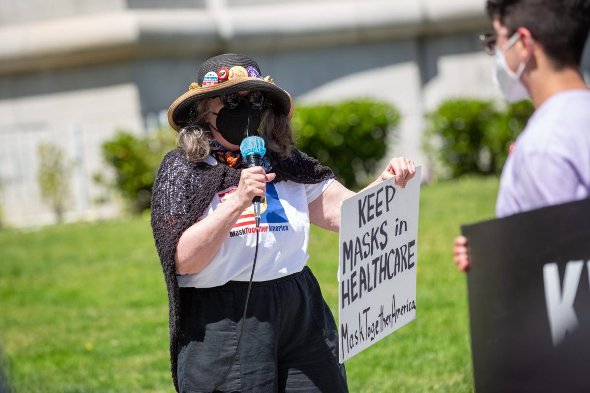 Ruth Robertson of the Raging Grannies speaks to fellow demonstrators outside San Francisco City Hall on April 16, 2024 in San Francisco, Calif. 