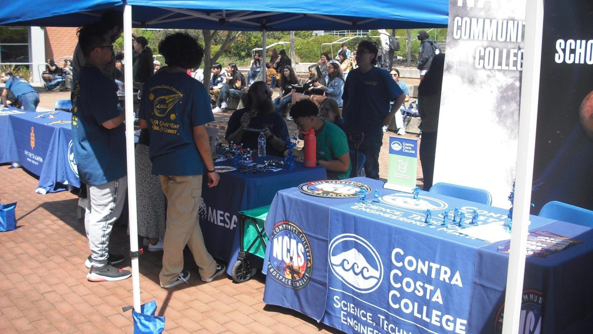 CCC MESA club discussing with students during Comet Day at Contra Costa College in San Pablo, CA, on Thursday, April 18, 2024.