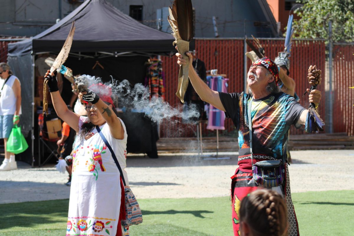 Calpulli Coatlicue blessing the Seven Directions at the Indigenous Red Market in Derby Ave. in Oakland, Calif., on Oct. 6,2024