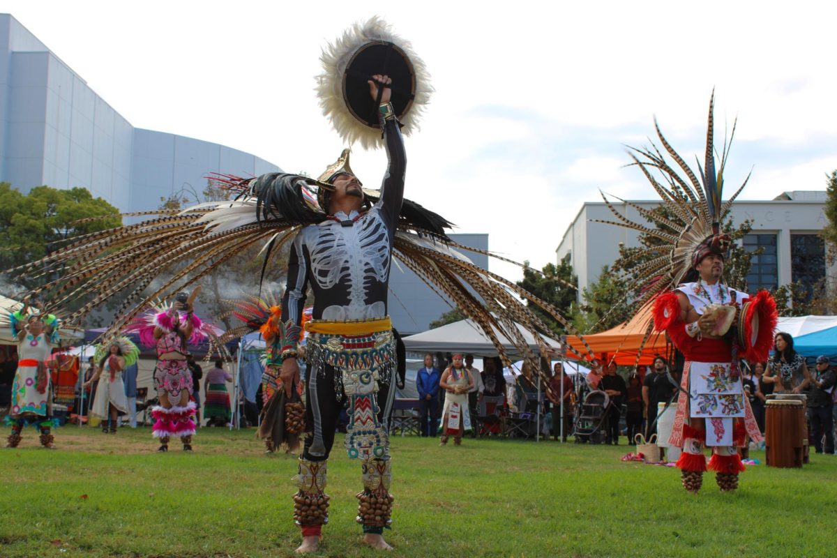 Sonoma County Pomo Dancer Ome Tekpatl Grupo performs the Fuego Dance at the 32nd annual "Indigenous Day Pow Wow" in MLK Civic Center Park in Berkeley, Calif., on October 12, 2024.