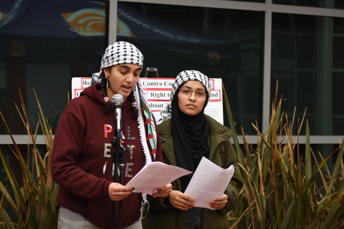 Sophie and Eman A talking about the Lack of rights for middle eastern students. At Contra Costa College, San Pablo, Calif. Nov. 