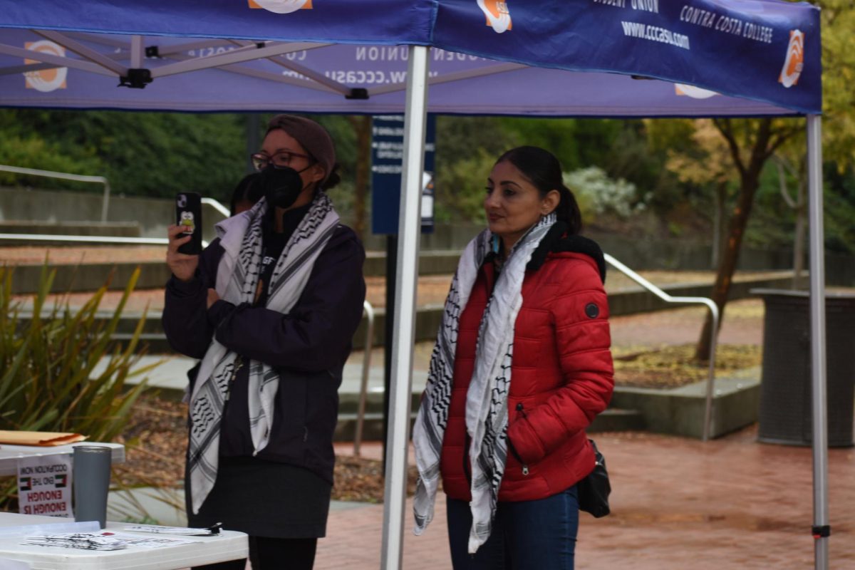 Camille Santana and Lorena Gonzalez supporting students. At Contra Costa College, San Pablo, Calif. Nov. 