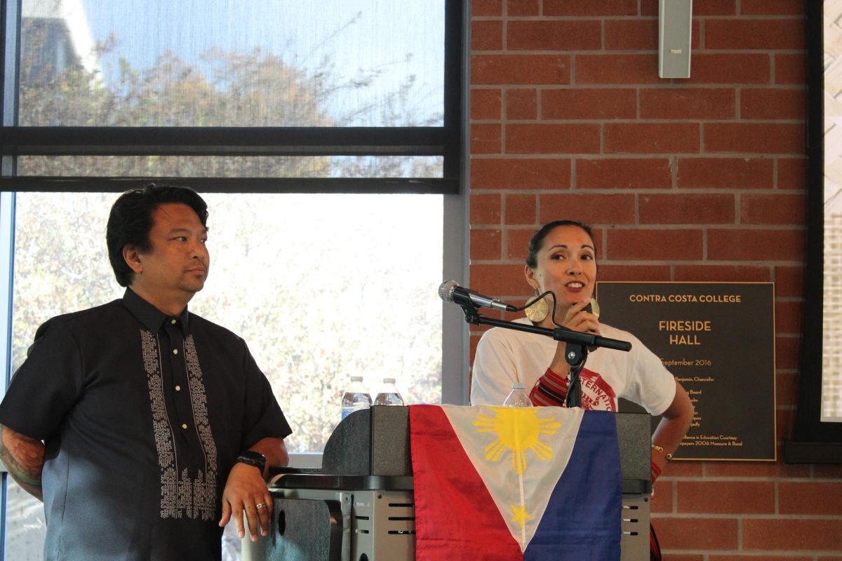 Camille Santana and Edel Alon talking to the audience in the Fireside hall at Contra Costa College, San Pablo, Calif. on Oct. 30, 2024