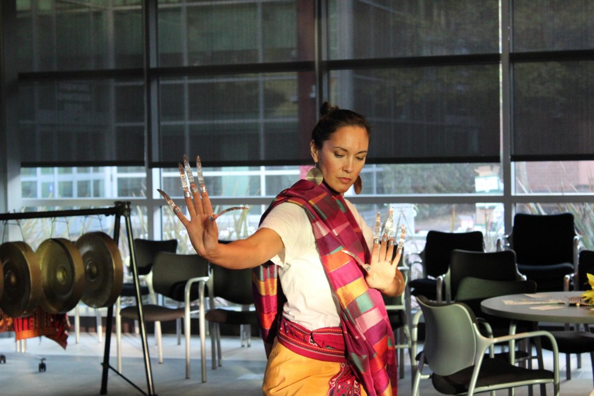 Camille Santana performing the Janggay dance in the Fireside hall at Contra Costa College, San Pablo, Calif. on Oct. 30, 2024