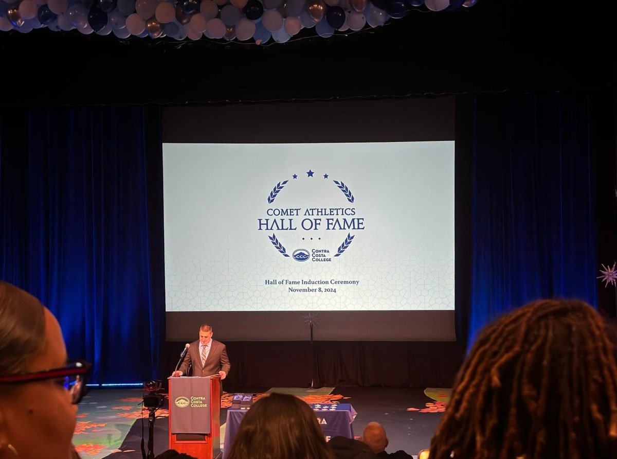 Athletics Director Kyle Avlarado presenting at the Comet Athletics Hall of Fame Ceremony at Contra Costa College in San Pablo, Calif.