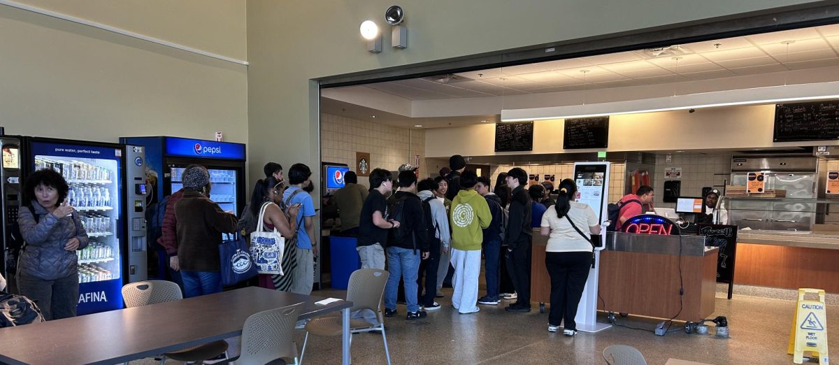 Picture of students in line Waiting for free lunch 
 Time 1:00 pm 
 On February 26 2025 