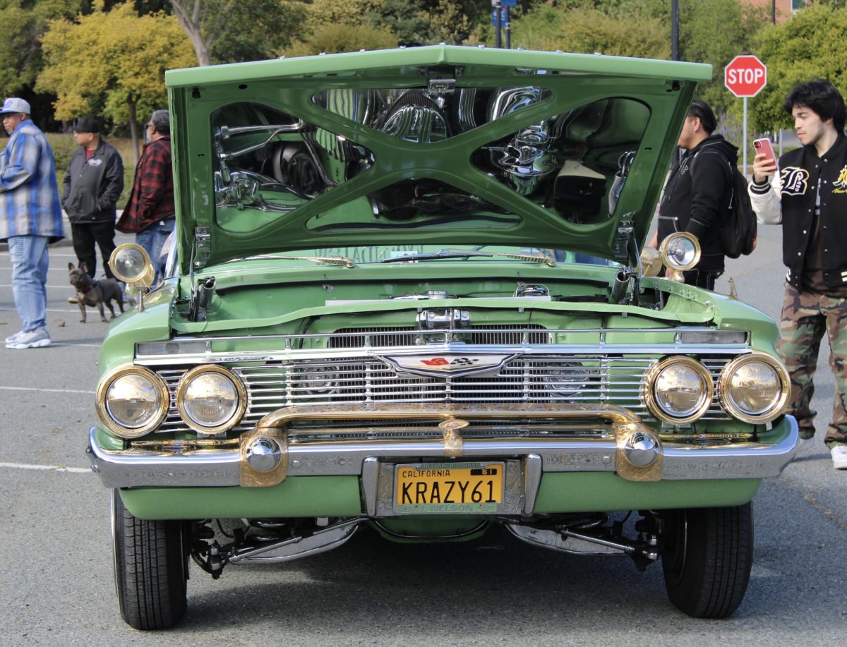 Light Green Chevy Impala convertible 