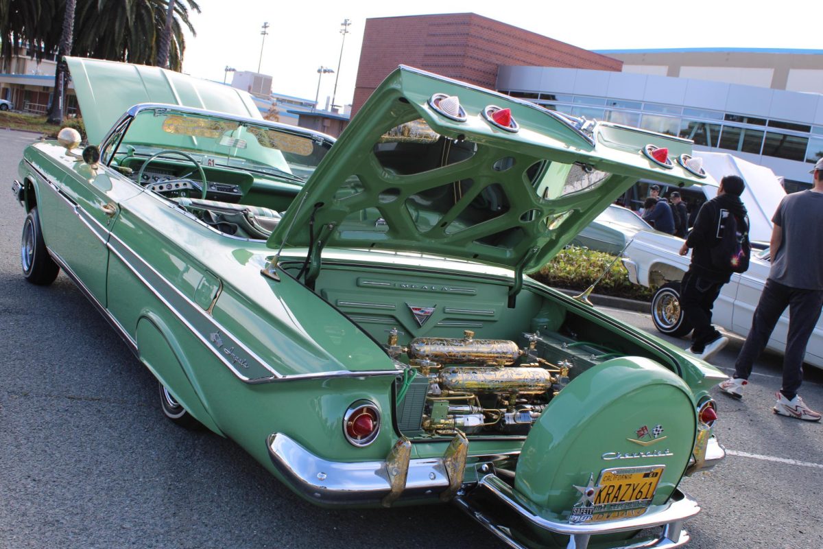 light Green Chevy Impala convertible 
