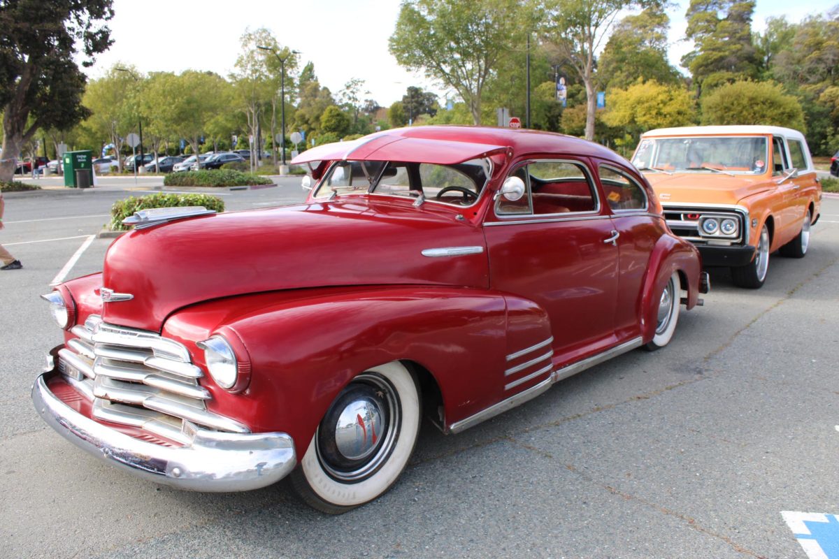 Red Chevy Fleetmaster  and Orange GMC  