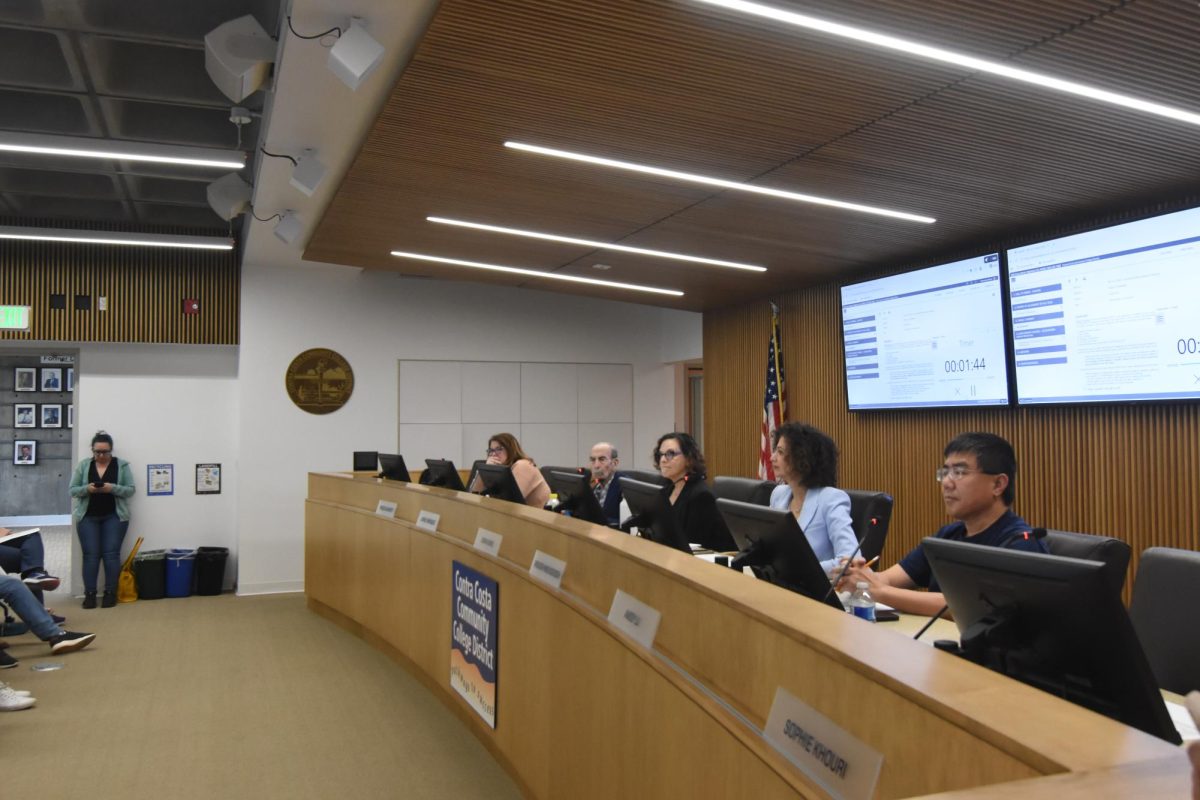 Contra Costa Community College District Governing Board members Rebecca Barrett, John Márquez, Diana Honig and Andy Li and Chancellor Mojdeh Mehdizadeh listen to public comment from staff and supporters at an emergency meeting at the district’s headquarters in Martinez, Calif., on March 13, 2026. (Carmen Corona/The Advocate)