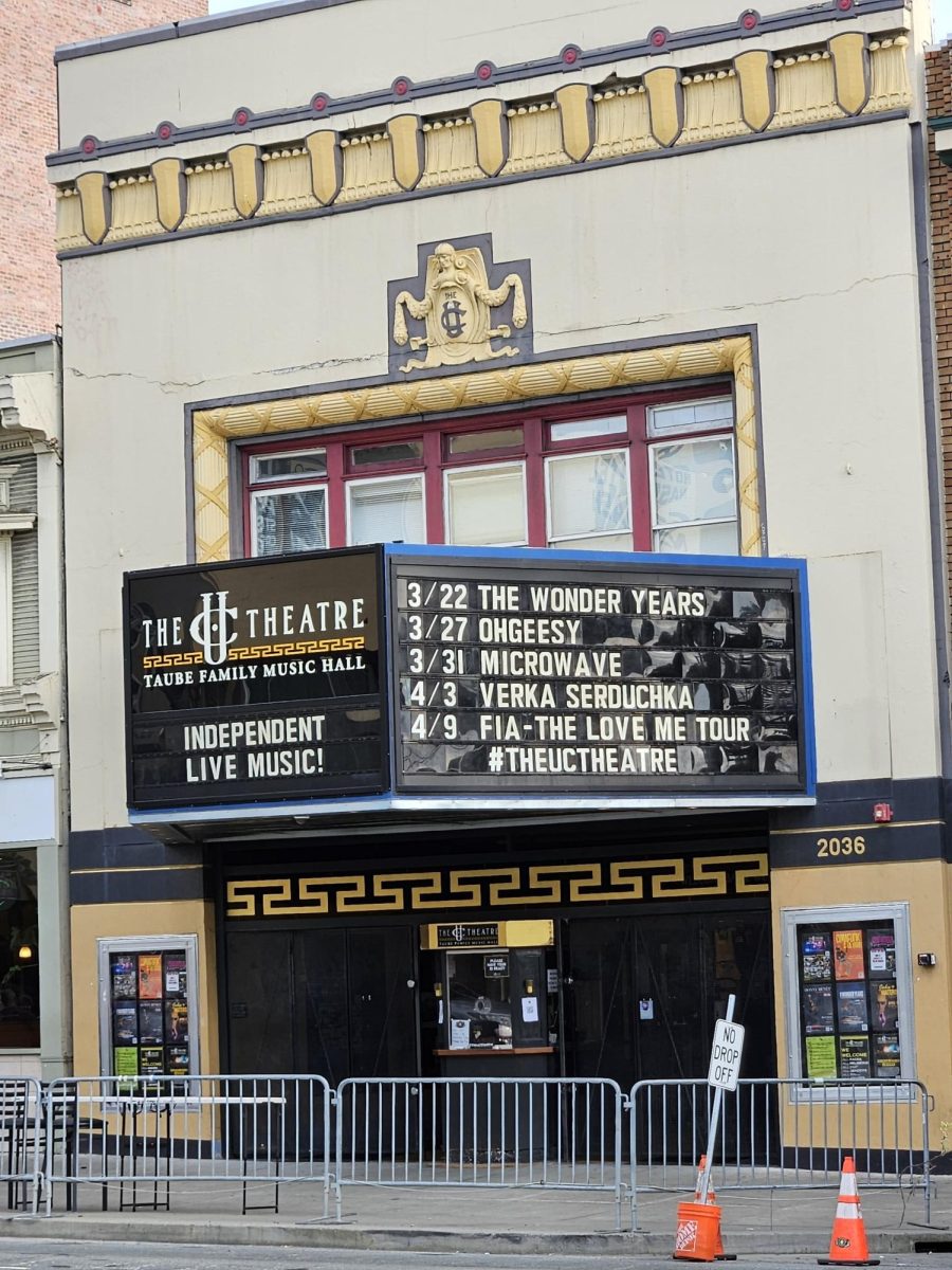 The day of the show, UC Theatre’s front sign shows a list of upcoming shows, including the March 22nd show featuring The Wonder Years. Taken earlier in the day, the barricades and cones indicate a long line is to be expected. (Sunday, March 22, 2026)
