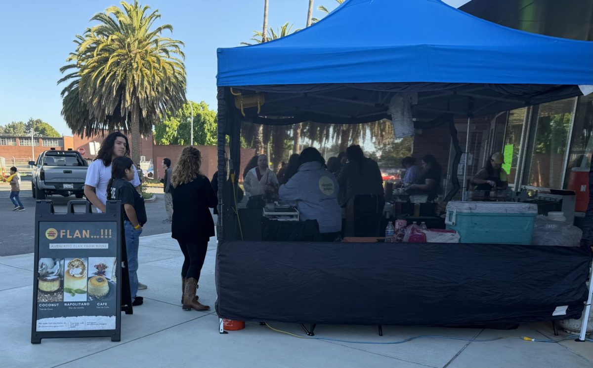 People in line for Michoacan Burgers and Decorating Dessert at CCC parking lot 6 on friday May 8, 6:04p.m.