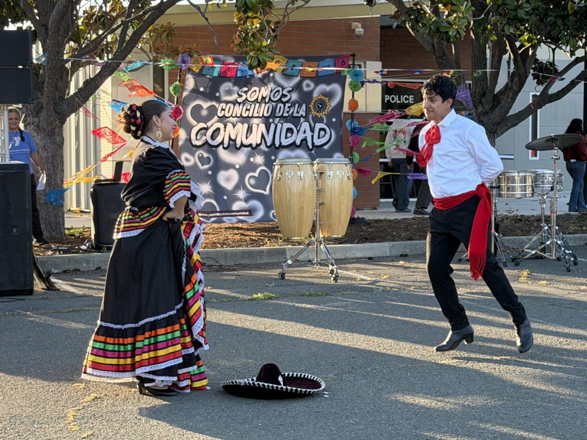 Alma Latina from Richmond high shows  students  dancing folklorico in the parking lot 6 at CCC Friday May 8, 6:58 p.m.