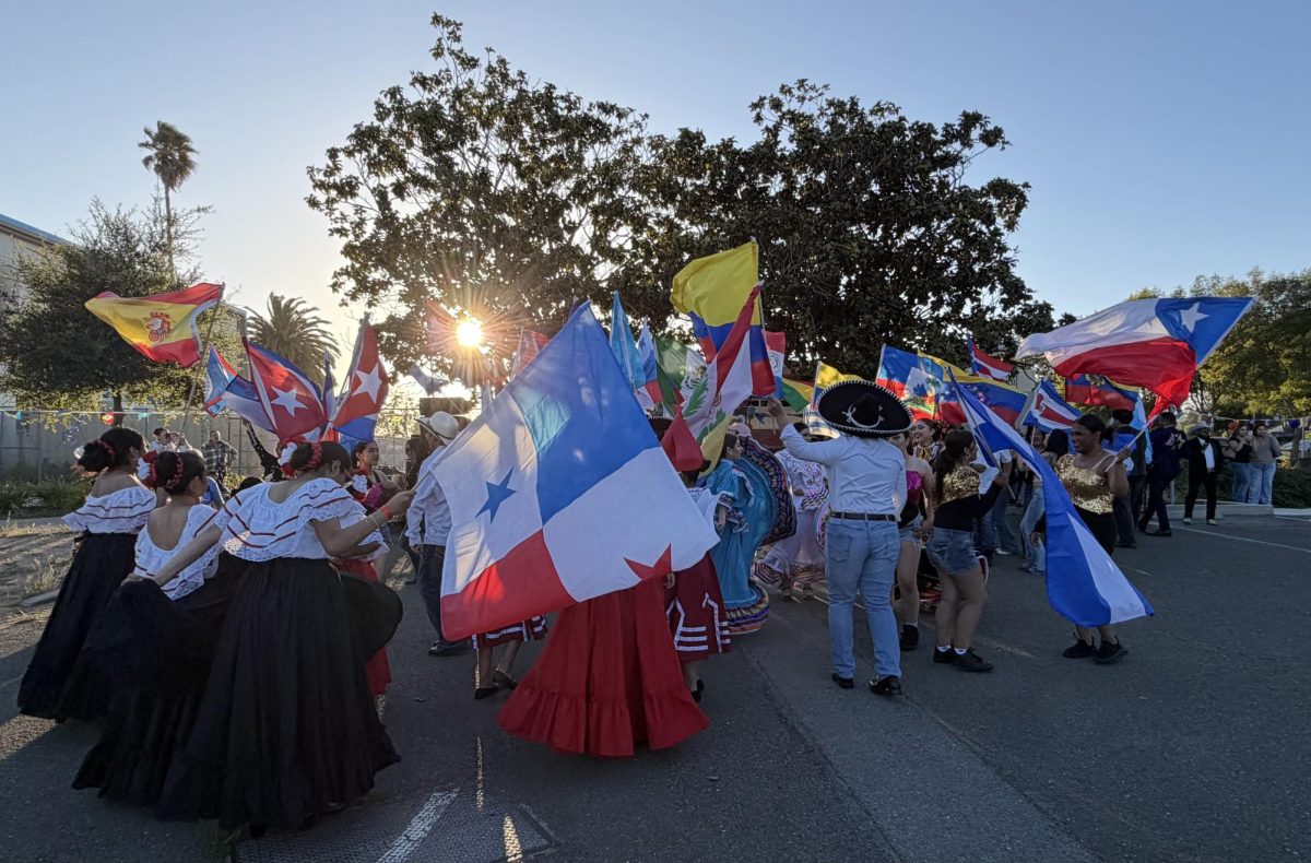 beautiful Hispanic flags waved by students of the community at CCC parking lot 6 on friday May 8, 7:16 p.m. 